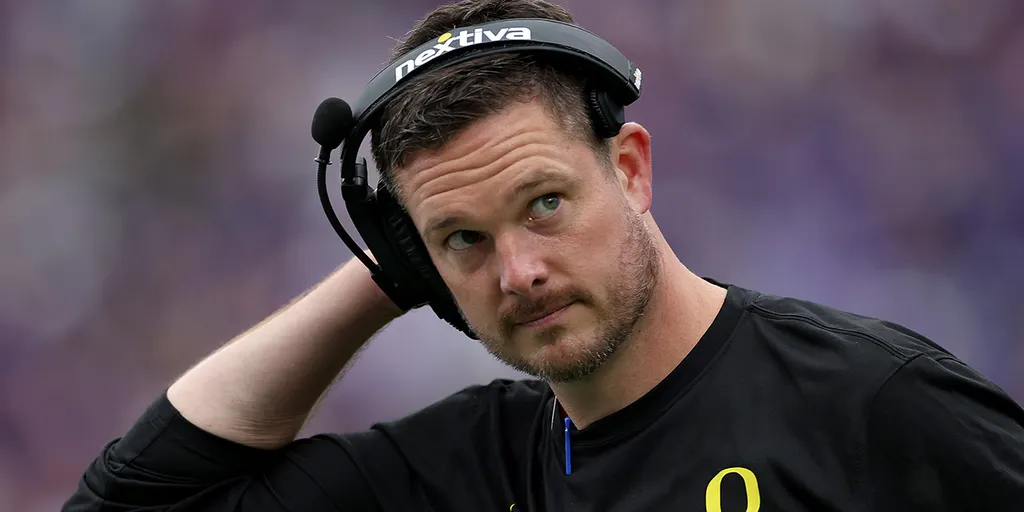 Dan Lanning, the coach for Oregon, responds to a play against BYU in the initial half of an NCAA college football match. (Source: foxnews)